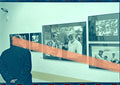 Original photographic negative of a visitor in front of photographs by Ernest Hemingway, Valencia exhibition 1999 35mm film Rare