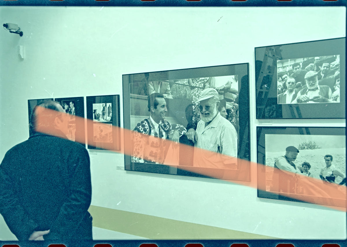 Original photographic negative of a visitor in front of photographs by Ernest Hemingway, Valencia exhibition 1999 35mm film Rare