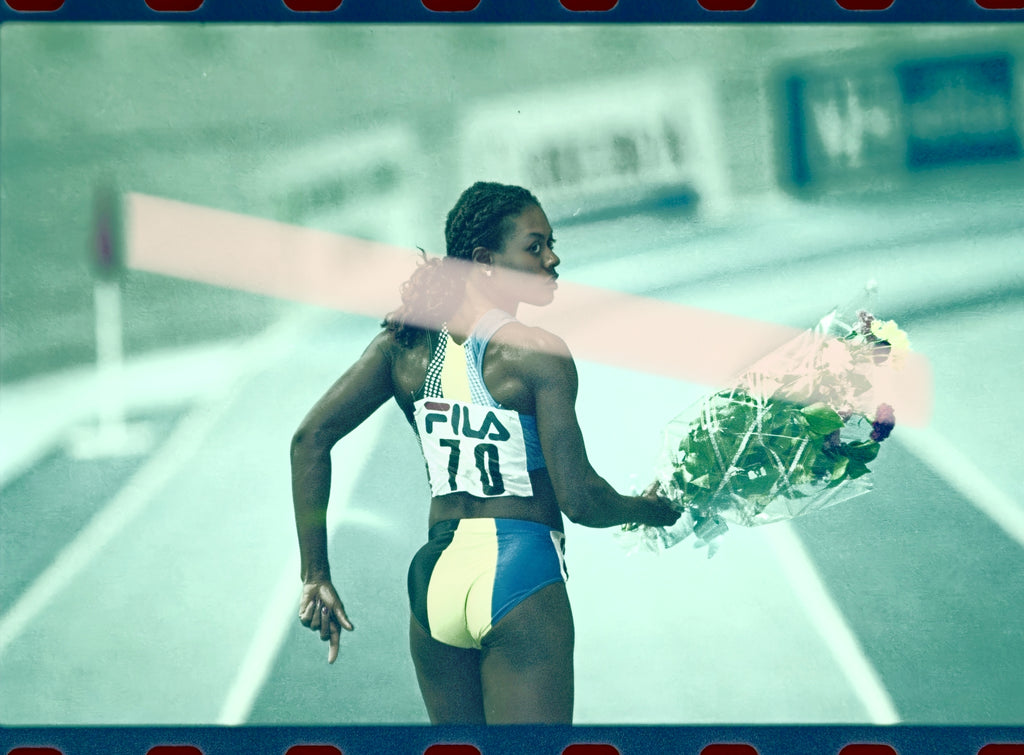 Negativo fotográfico original Merlene Ottey atleta con flores tras los 60 metros Valencia 2000 35mm film Rare