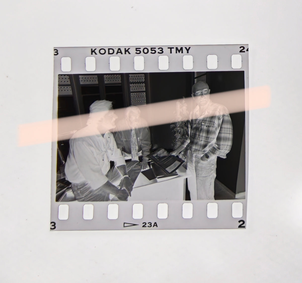 Original photographic negative of writers Joan Manuel Tresserras, Víctor Batallé, and Enric Marín meeting in an office, Premis Octubre Valencia 1994, 35mm film, rare.