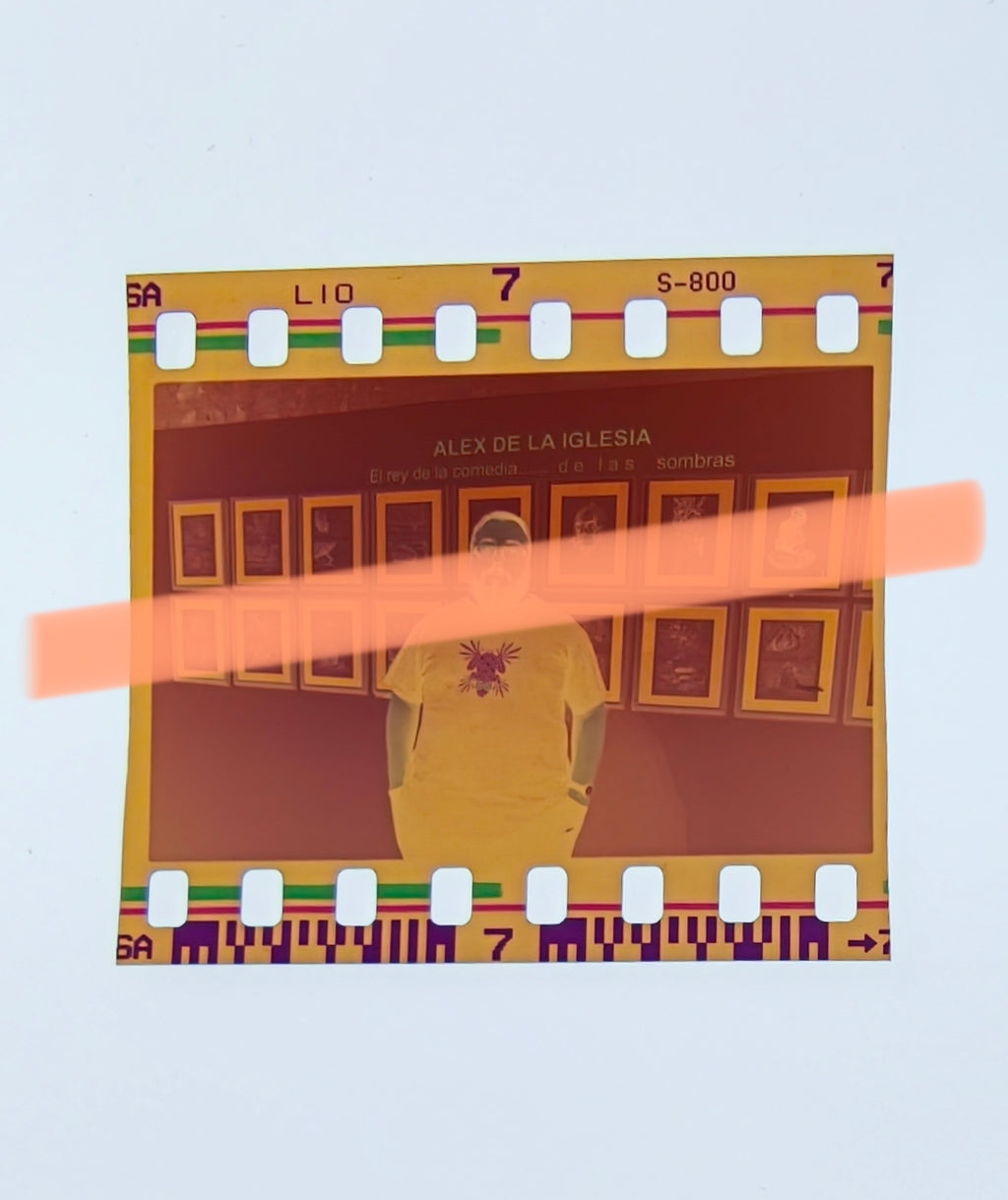 Original photographic negative Álex de la Iglesia standing in front of graphic display Valencia 2002 35mm film Rare