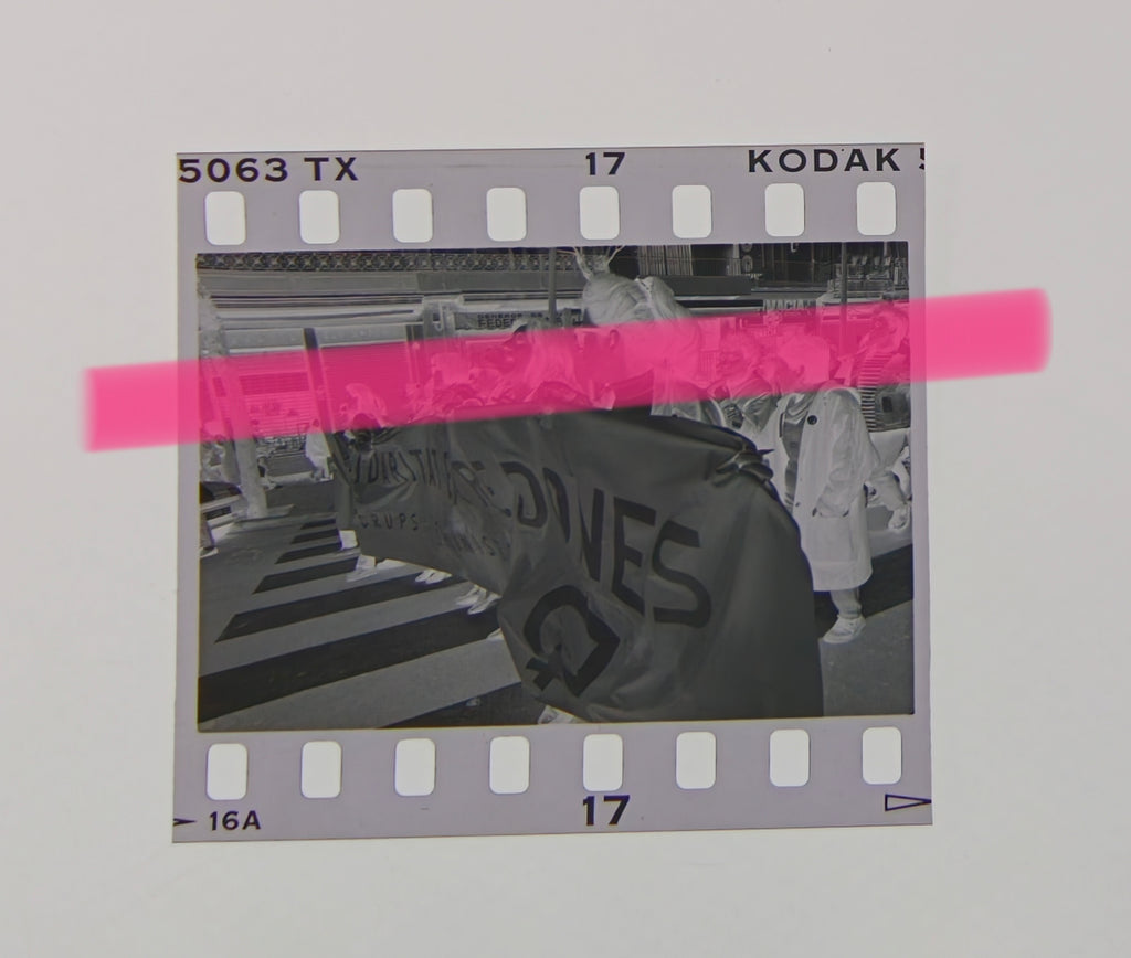 Original photographic negative, feminist symbol in the foreground during the March 8th march in Valencia, 1992, 35mm film, Rare