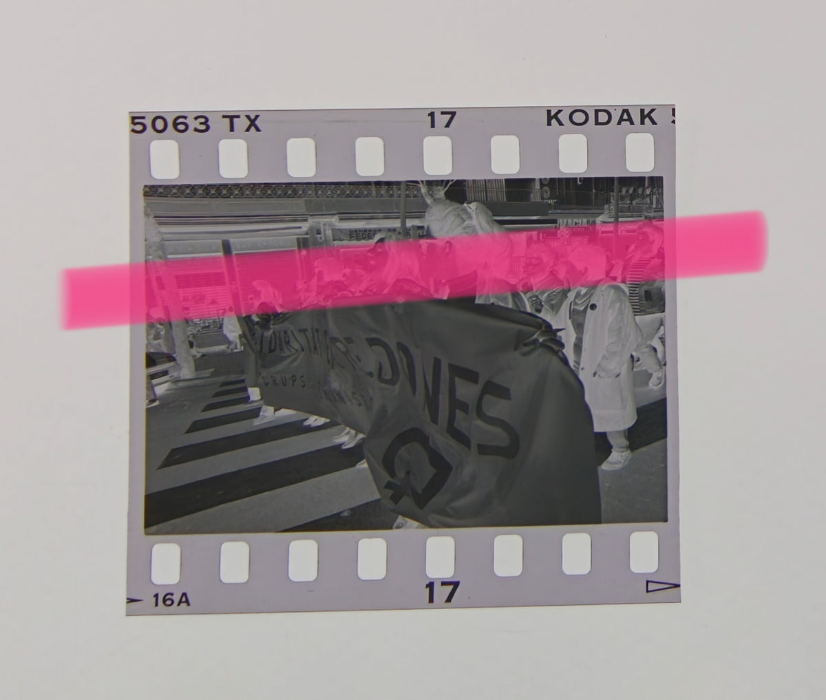 Original photographic negative, feminist symbol in the foreground during the March 8th march in Valencia, 1992, 35mm film, Rare