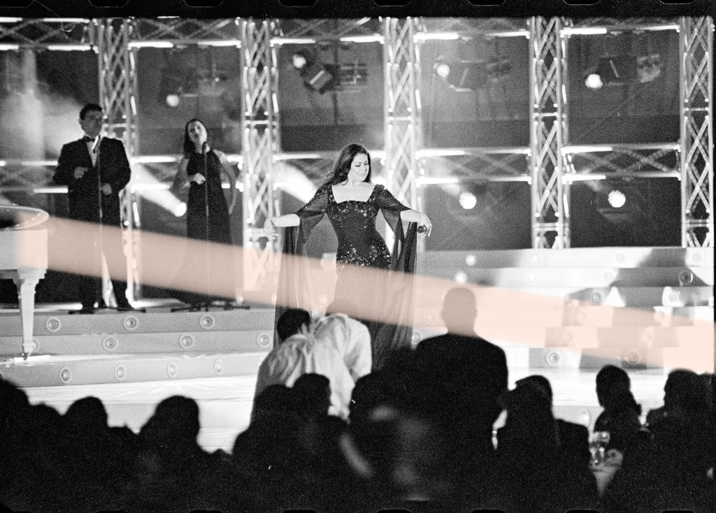 Original photographic negative of singer Isabel Pantoja spreading her dress on stage at the 1997 Nova Valencia Awards, 35mm film, Rare