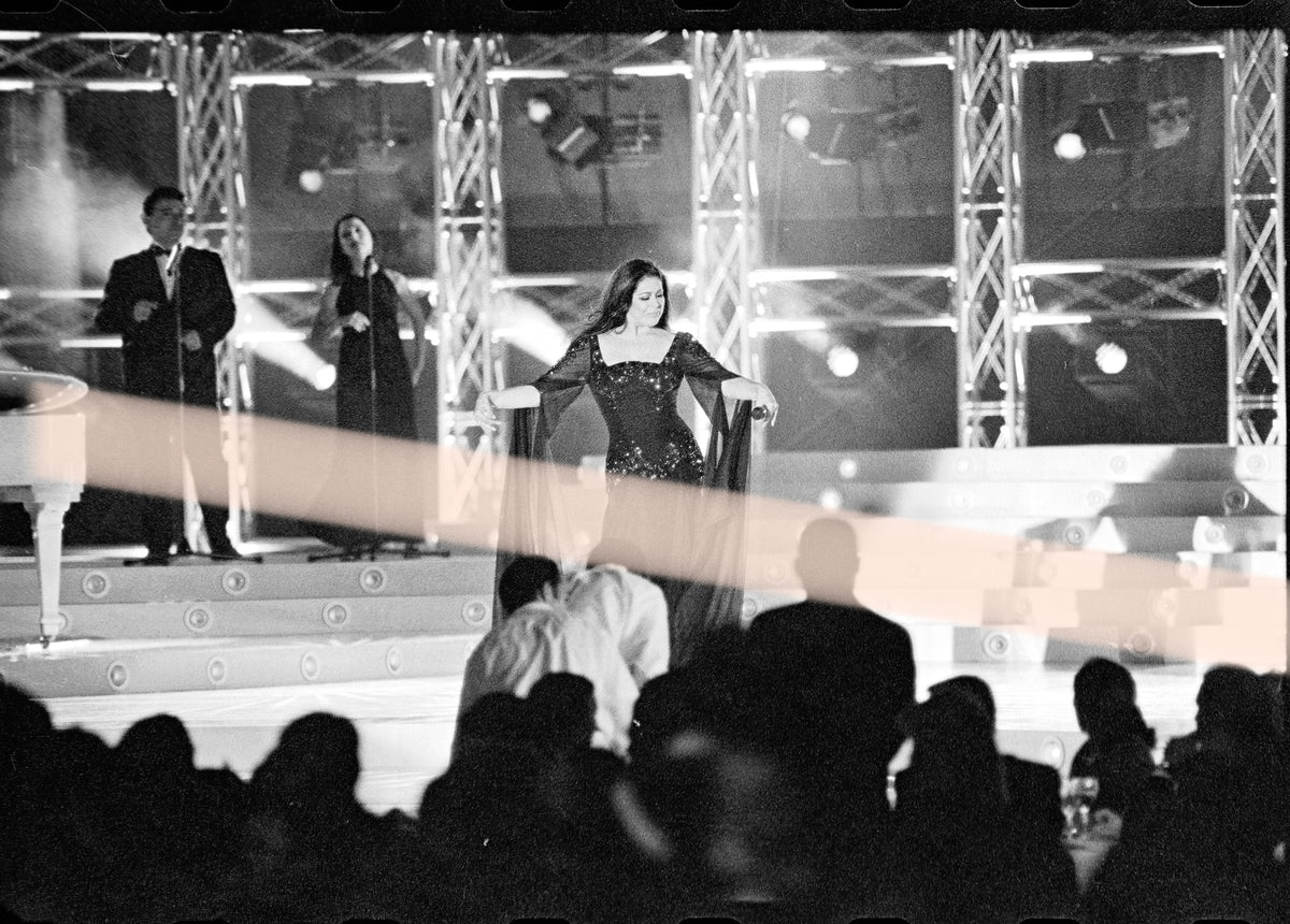 Original photographic negative of singer Isabel Pantoja spreading her dress on stage at the 1997 Nova Valencia Awards, 35mm film, Rare